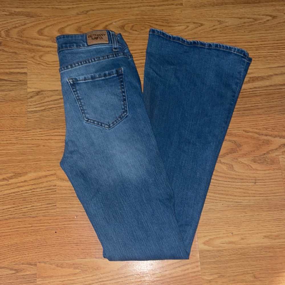 Bethany Mota flare jeans with rips. Worn quite a bit. No damages. Good as new.